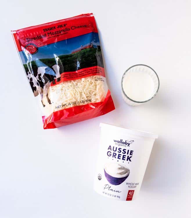 Fridge and Freezer Staples | New Ways Nutrition Having the right fridge and freezer staples can make or break a last minute meal. Learn tried and true dietitian secrets for always having the staples you need to make healthy family meals. Need to know what to do when you haven’t meal planned? Click through for the staples you shouldn’t be without! #familymealideas #healthymeals #mealtimetips