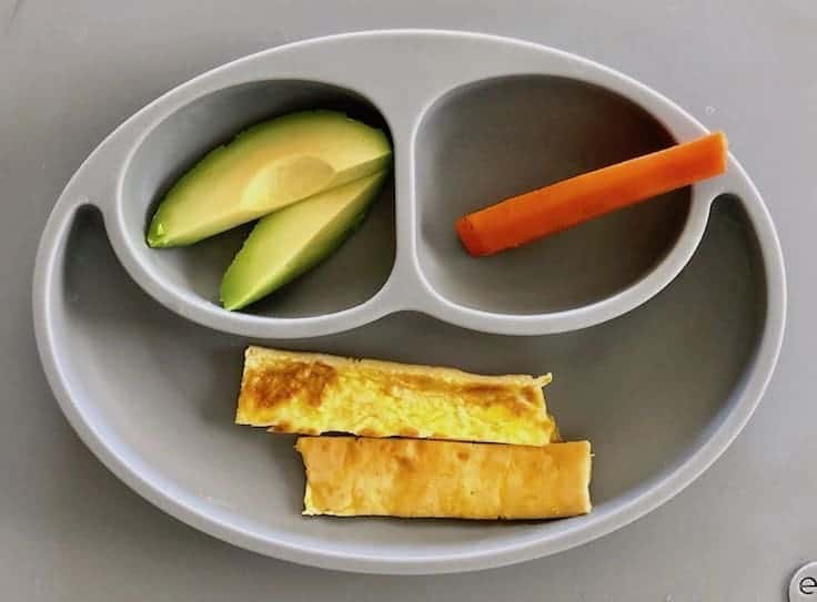 A balanced first meal with eggs, avocados, and steamed carrots