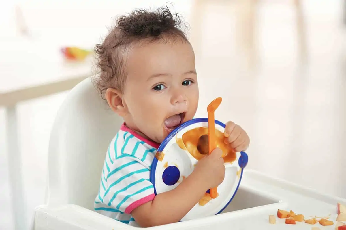 baby with plate