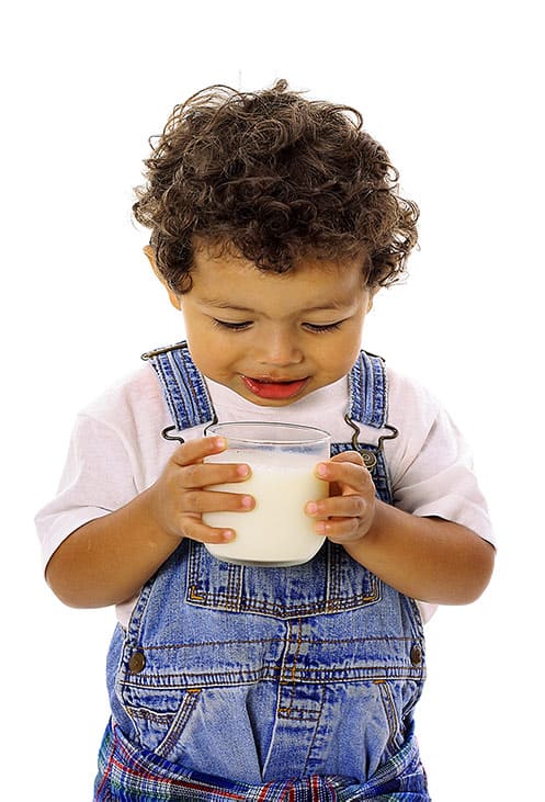 Little boy drinking milk