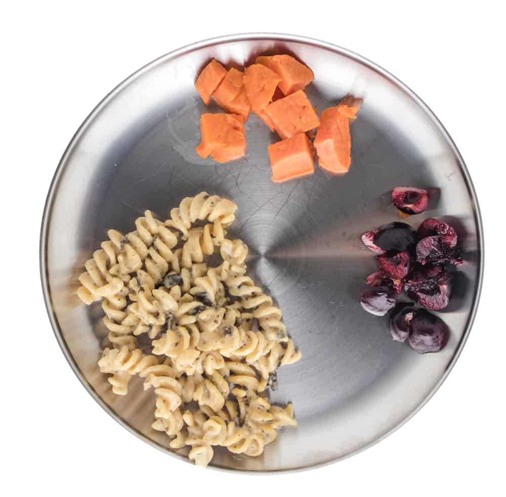 pesto pasta with sweet potatoes and cherries