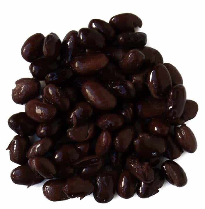 Black beans on white background